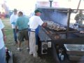 ROTARY'S RETIRED JUDGE HYDE COOKING AT EBSD